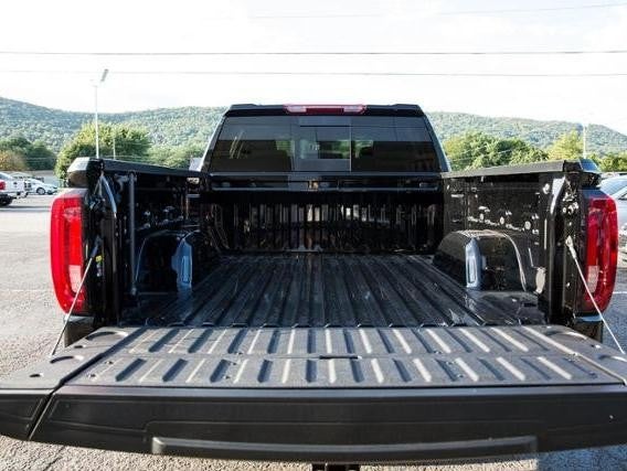 GMC Sierra back trunk box opened showing with holding hooks